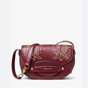 Michael kors Cary medium grommeted saddle bag in burgundy leather